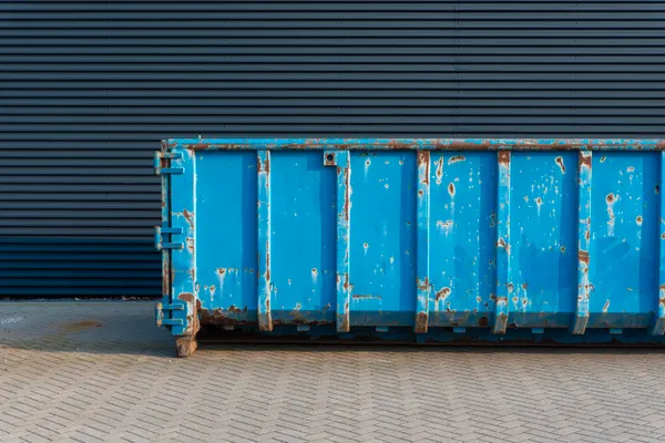Roll off dumpster container