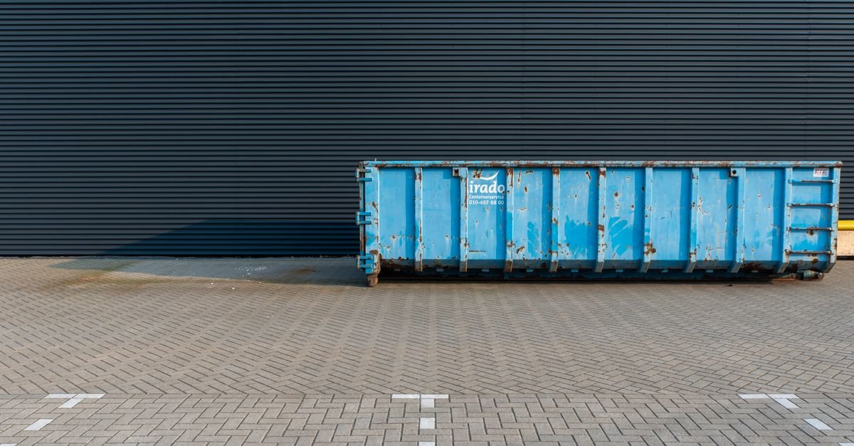 Blue roll off dumpster